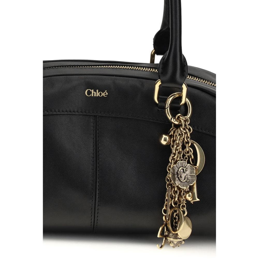 Schwarze Bowling-Handtasche